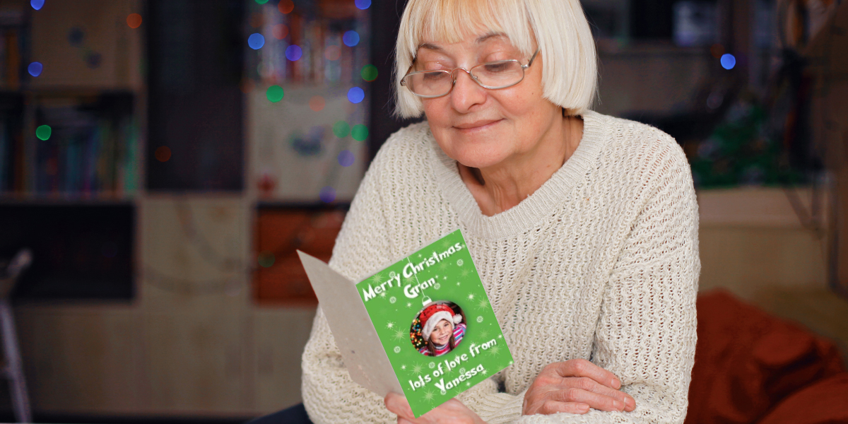 A personalised photo card being enjoyed